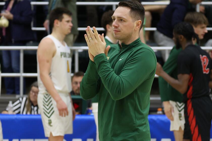 Justin Downer will replace Matt Logie as Point Loma Nazarene's head basketball coach.