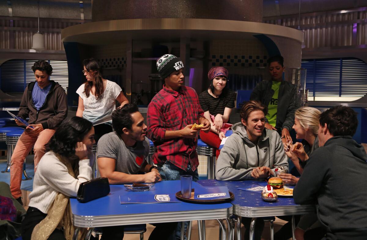 Members of the principal cast of "Grease Live!" rehearse a scene in the diner during a rehearsal of Fox's upcoming "Grease Live!" musical production.