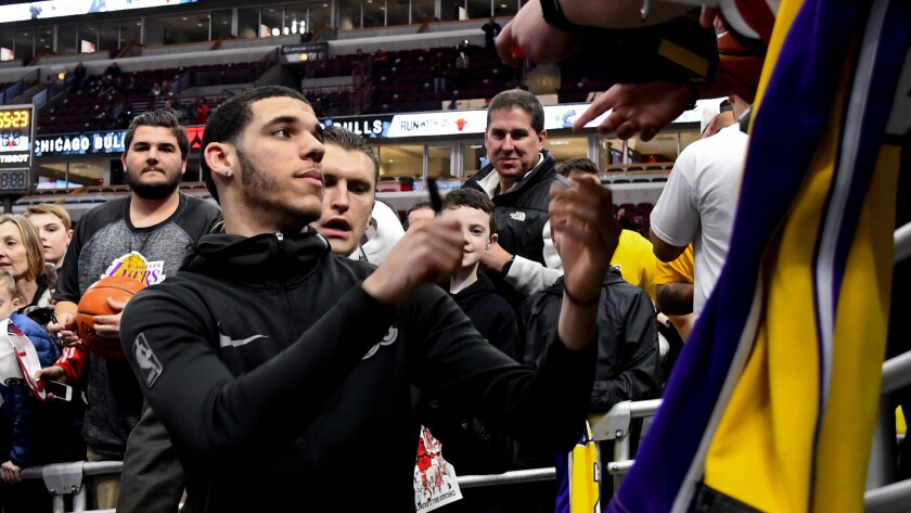 Lakers rookie point guard Lonzo Ball signs autographs before the team's against the Bulls in Chicago last month.