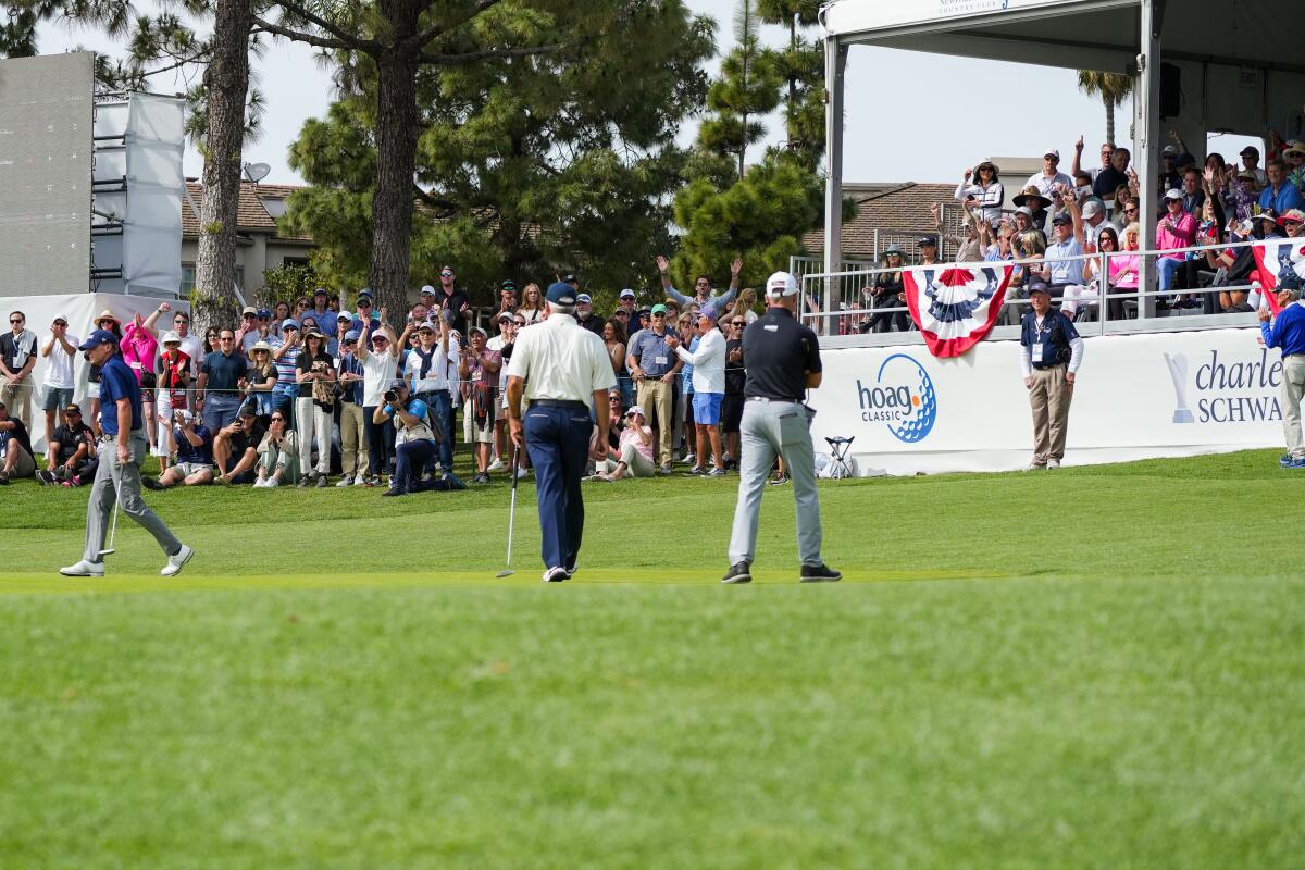 The roar of the crowd rises as golf pros make the shot at a previous Hoag Classic.
