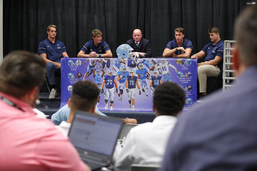 The Corona del Mar football team representatives with Mark Redman, Ethan Garbers, Coach Dan O'Shea, John Humphries, and Thomas Bouda at a first ever area media day at Mission Viejo High School on Wednesday, August 14, 2019. Participating schools were Corona del Mar, La Habra, Yorba Linda, Los Alamitos, Mission Viejo, San Clemente, San Juan Hills, and Tesoro.