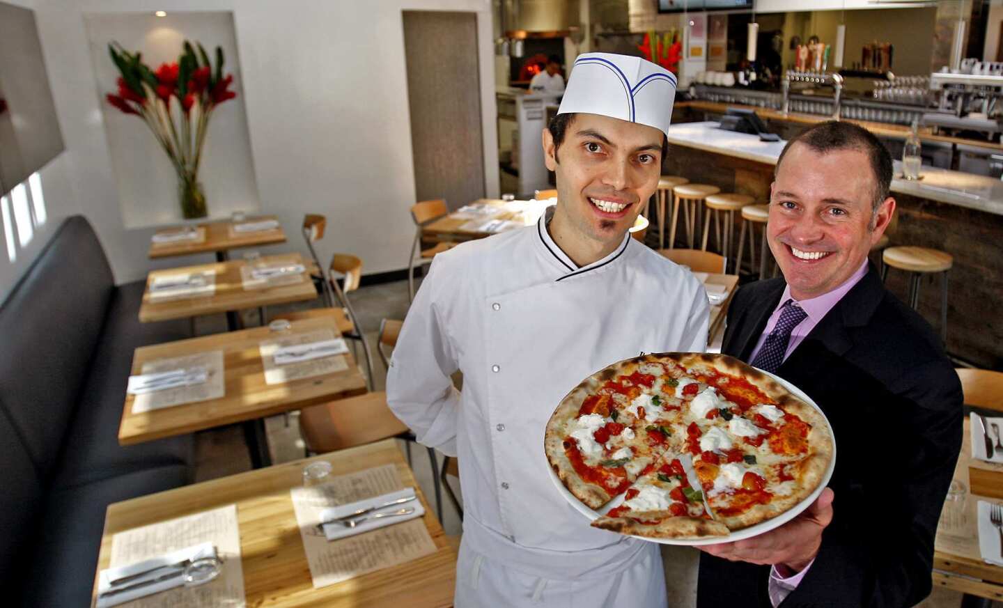 Pizzeria il Fico chef Giuseppe Gentile, left, and co-owner John Tierney at Pizzeria il Fico on North Robertson Boulevard.