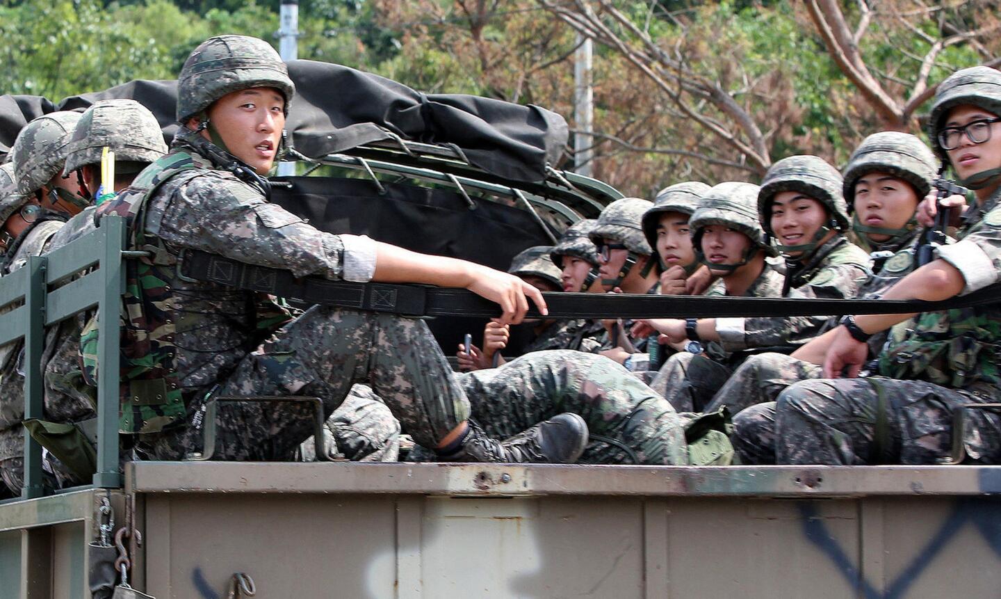 South Korean soldiers are transported in the border county of Yeoncheon as they remain on maximum alert amid threats from the North.