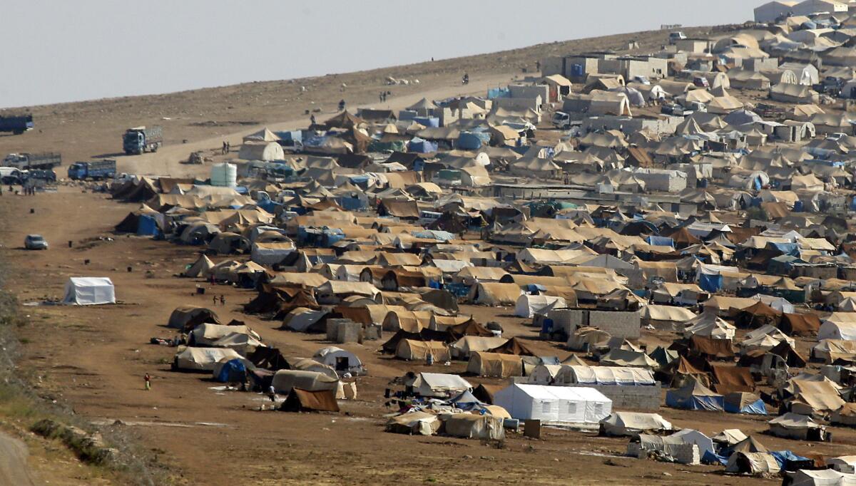 Climate change probably worsened the drought that preceded Syria's uprising, a new study suggests. Here, a refugee camp is seen in Syria near the Turkish border town of Cilvegozu.