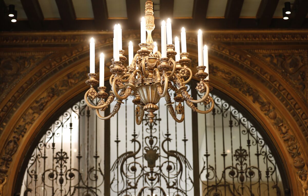 Restored chandeliers from molds of the originals hang in the historic lobby of the Herald Examiner Building