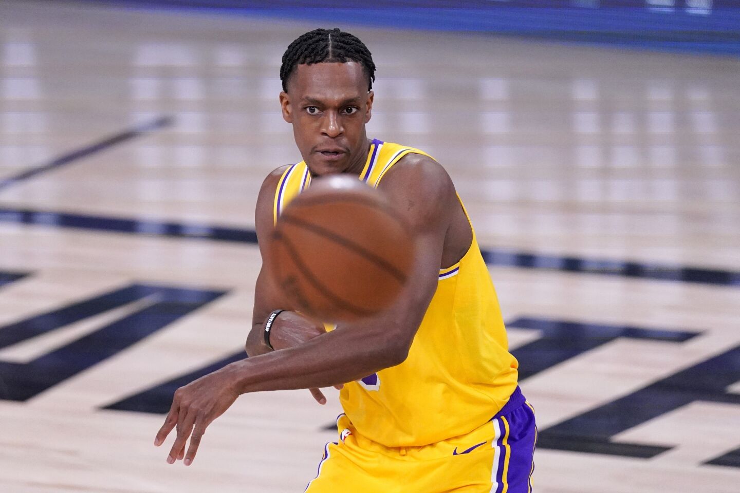 Lakers guard Rajon Rondo whips a pass to a teammate during Game 1.