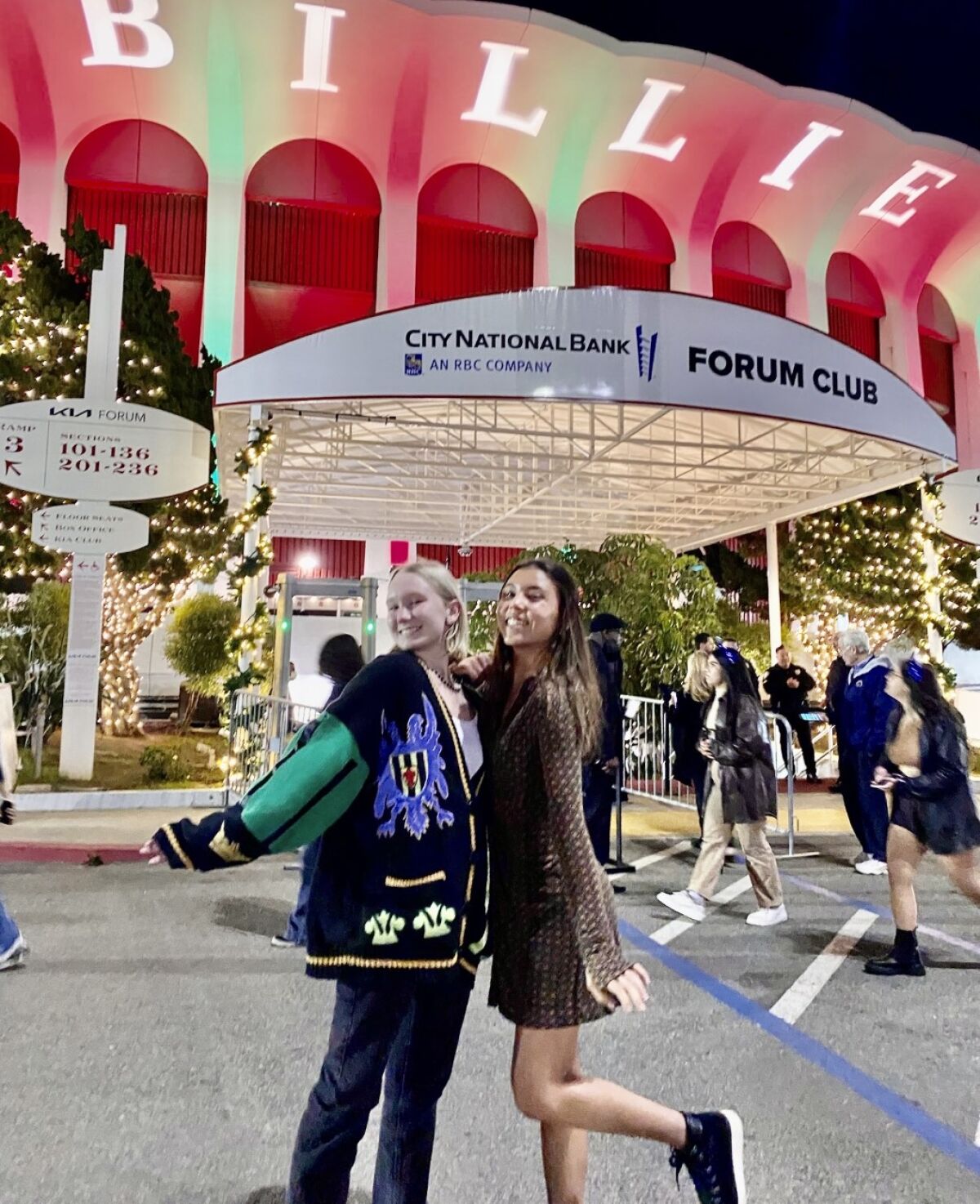Billie Eilish invited Ryan Berberet (left) and Sydney Kroonen to attend her concert at the L.A. Kia Forum in December.