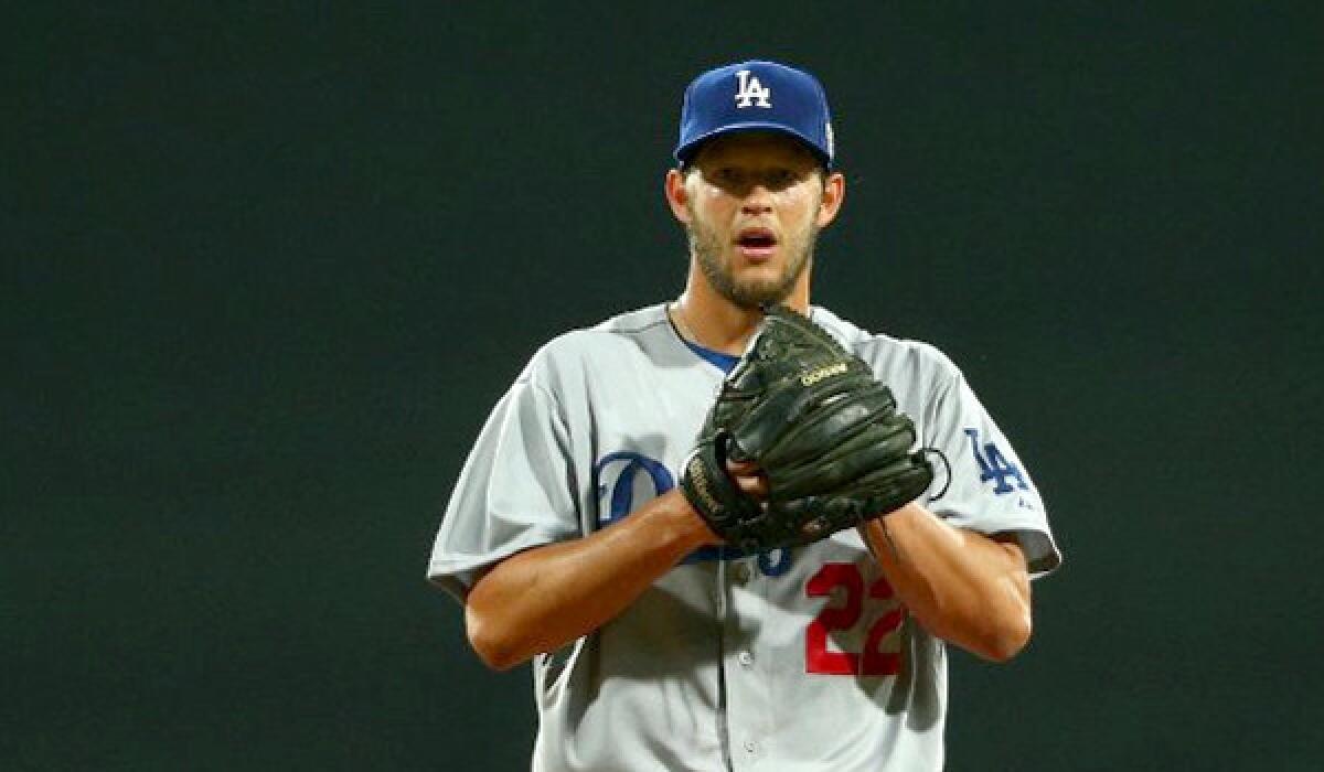 Clayton Kershaw's return to the mound for the Dodgers could be delayed through the entire month of April because of a strained back muscle.