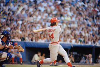 FILE - Pete Rose of the Cincinnati Reds in action at the bat against the Atlanta Braves.