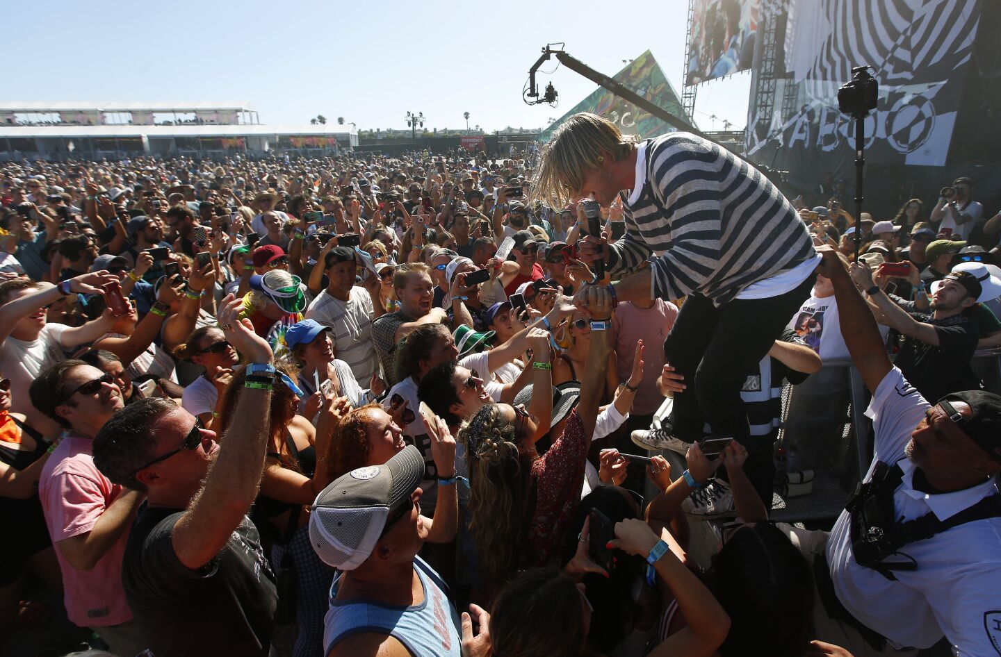 Jon Foreman of the band Switchfoot goes into the crowd at the Sunset Cliffs stage at KAABOO Del Mar on Saturday, Sept. 14, 2019.