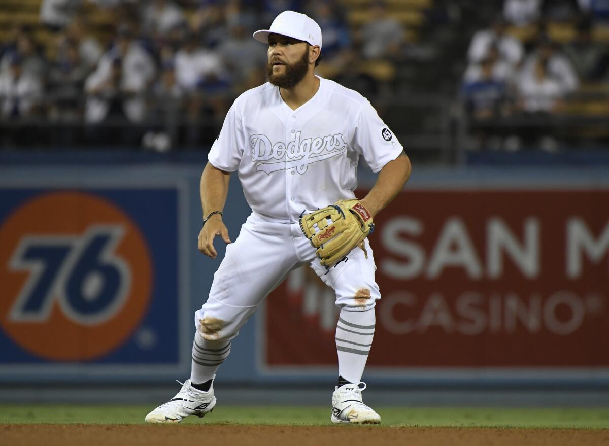Russell Martin plays third base during the Dodgers' loss to the New York Yankees on Friday.
