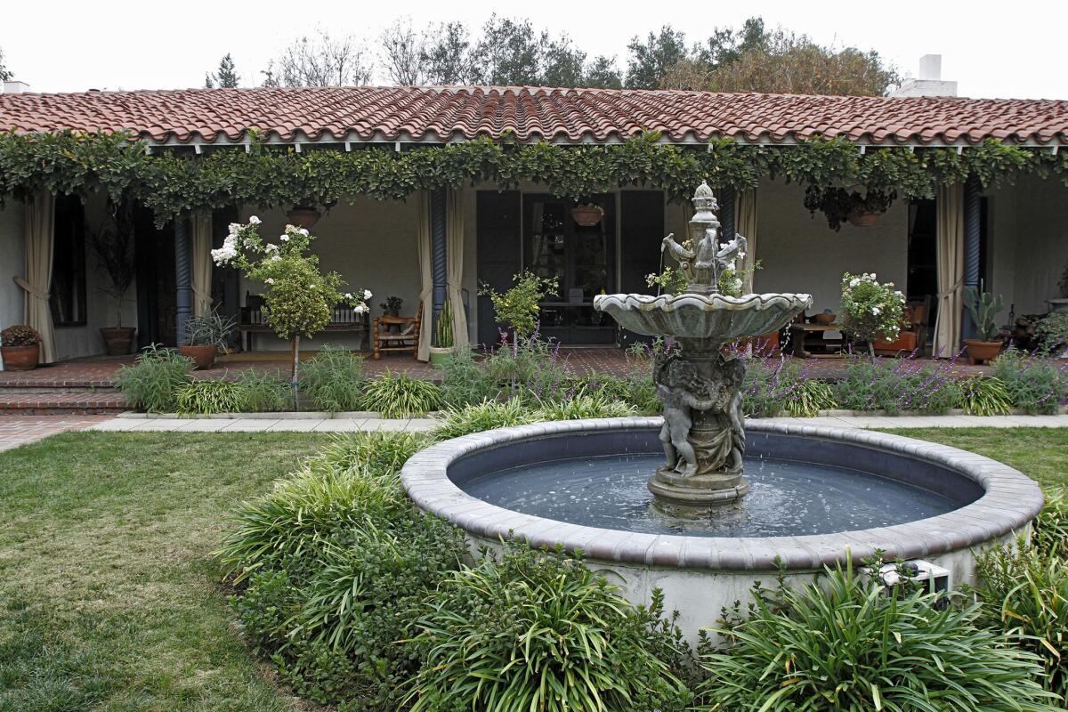 The owners of the Spanish Colonial Revival home at 619 Meadow Grove St. in La Cañada are applying for a Mills Act Contract for their 1922 property, shown on Tuesday, Nov. 12, 2013.