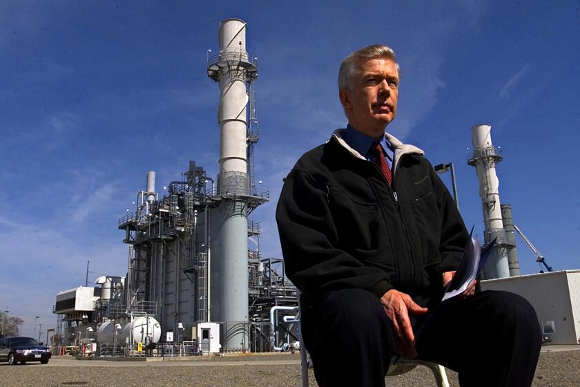** ADVANCE FOR SUNDAY, SEPT. 29 -- FILE ** California Gov. Gray Davis waits for the start of a news conference held at a co-generation plant owned by the Sacramento Municipal Utility, Tuesday, March 13, 2001. After taking almost two years of criticism caused by his reaction to the state's energy crisis and budget problems, Gov. Gray Davis is trying to avoid being the first Democrat to lose his bid for a second term since 1942. (AP Photo/Rich Pedroncelli, File)