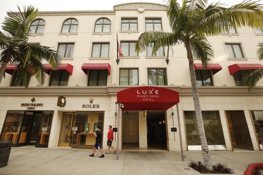 BEVERLY HILLS, CA - SEPTEMBER 21: The Luxe Rodeo Drive Hotel located at 360 North Rodeo Drive in Beverly Hills has closed as a casualty of a COVID pandemic that is likely to put more hotels out of business. The 86-room hotel, which for 27 years shared a city block with high-end outlets notified its workers last week that it would permanently cease operations because of the financial effects of the COVID-19 crisis. Rodeo Drive on Monday, Sept. 21, 2020 in Beverly Hills, CA. (Al Seib / Los Angeles Times