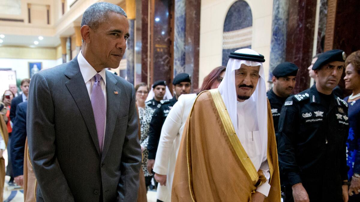 President Barack Obama and Saudi Arabia's King Salman walk together to a meeting at Erga Palace in Riyadh, Saudi Arabia, on April 20.