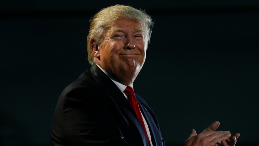 Republican presidential candidate Donald Trump smiles during a rally in San Jose, Calif. on June 2.