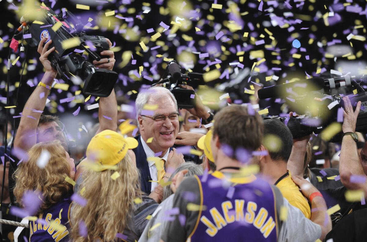 Lakers coach Phil Jackson celebrates following the team's victory over the Boston Celtics in Game 7 of the 2010 NBA Finals.