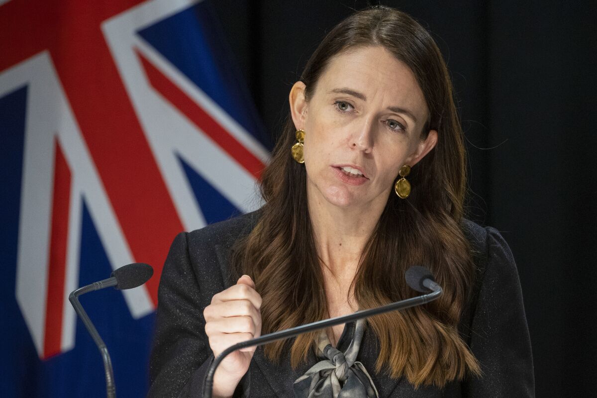 New Zealand Prime Minister Jacinda Ardern gestures during the post-Cabinet press conference in Wellington, New Zealand, Monday, March 7, 2022. New Zealand's government plans to rush through a new law this week that will enable it to impose economic sanctions on Russia over its invasion of Ukraine. (Mark Mitchell/Pool Photo via AP)