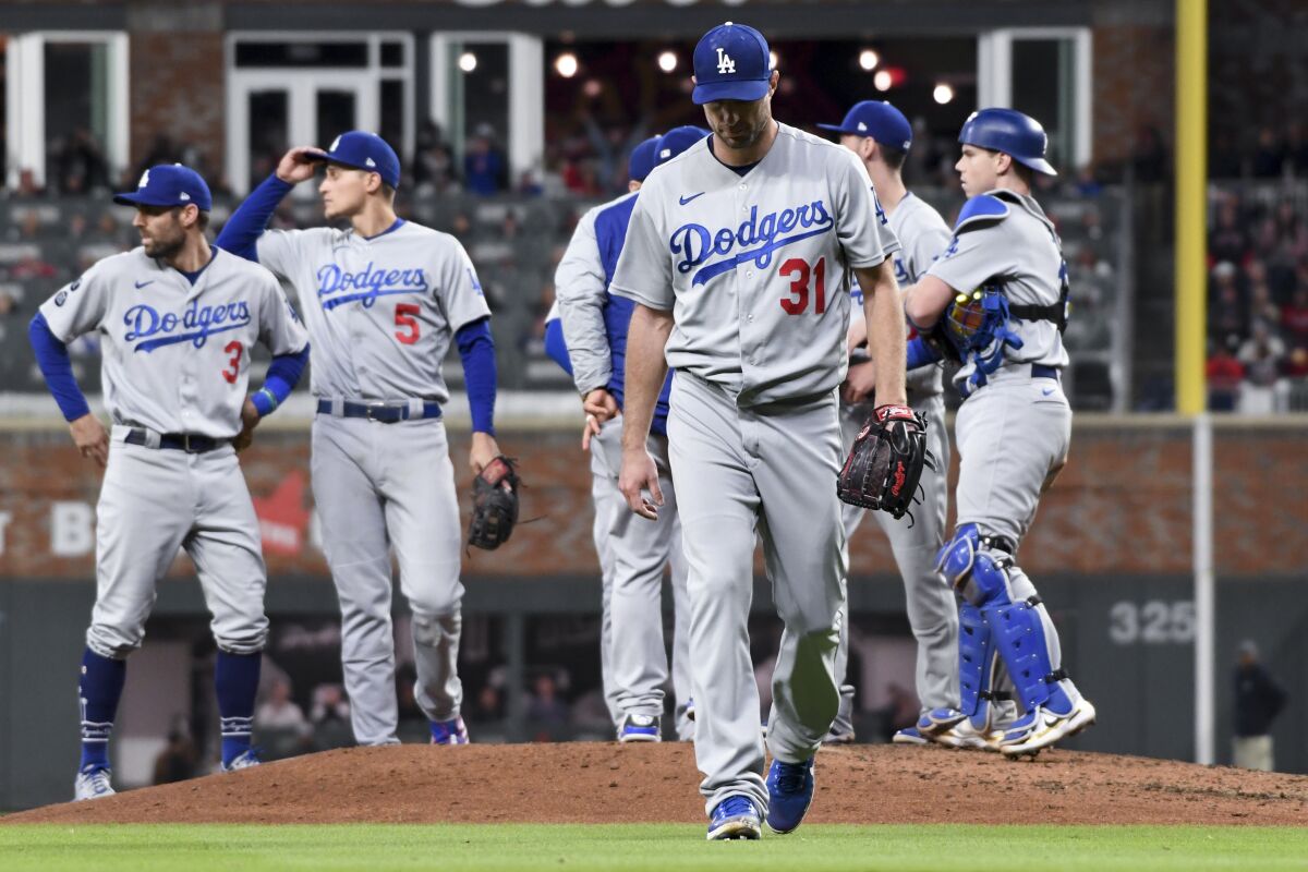 Atlanta, GA - October 17: Los Angeles Dodgers starting pitcher Max Scherzer walks off the the field.