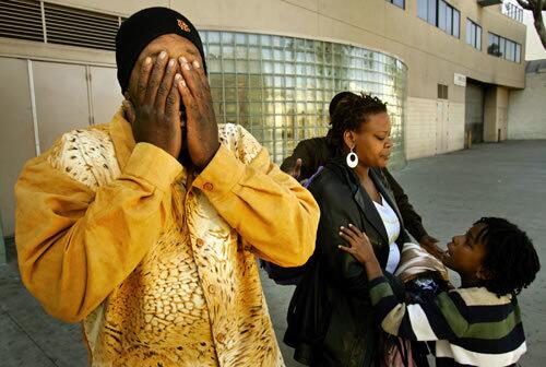 In front of the Union Rescue Mission, Christopher Barnes becomes tearful upon hearing that social workers have found help for his family of seven, including his wife, Shannon, and son Chris. Los Angeles County is targeting homeless families with children in the hope of relocating them to a safer place than skid row.