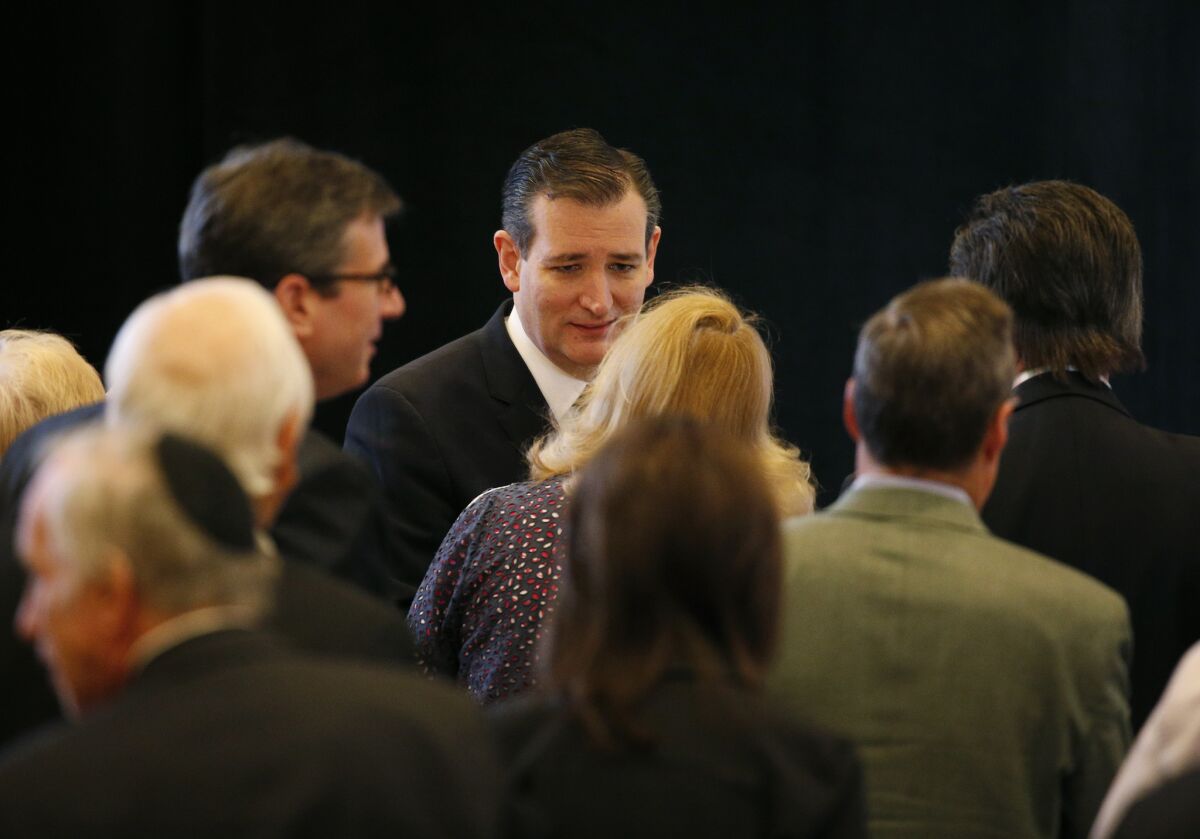 Sen. Ted Cruz of Texas, a Republican presidential candidate, meets with audience members after speaking at the Republican Jewish Coalition meeting Saturday in Las Vegas.