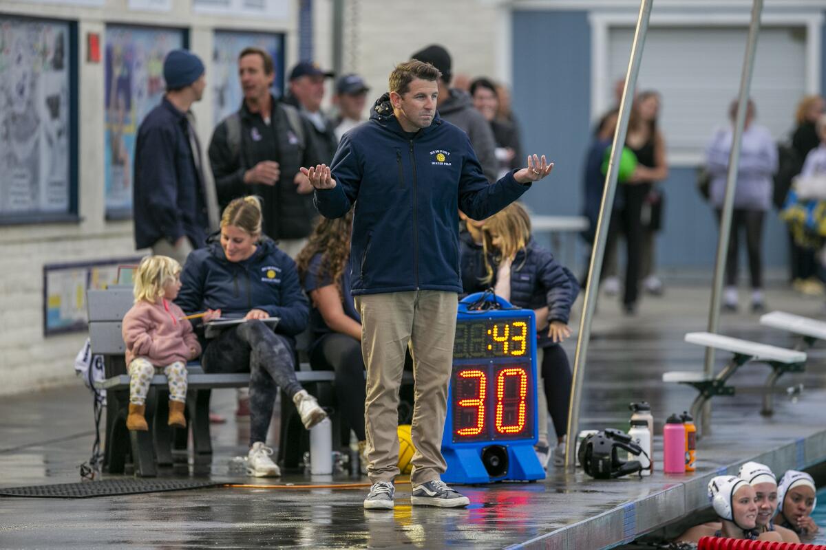 Newport Harbor coach Ross Sinclair gestures to his team during the quarterfinals of the Bill Barnett Holiday Cup.
