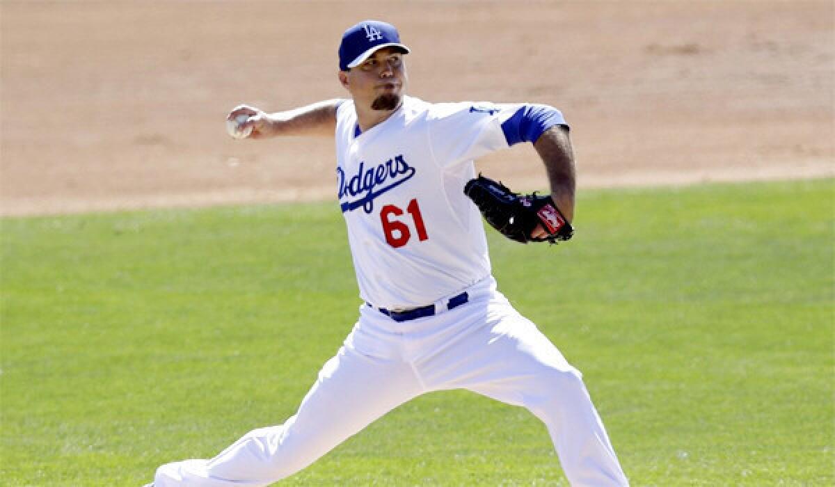 Josh Beckett held the Giants to just one hit over two innings and struck out three in his first start of spring training.