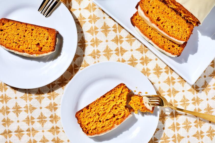 LOS ANGELES, CA - SEPTEMBER 8, 2022: Pumpkin maple drizzle tea cake, prepared and sliced by cooking columnist Ben Mims on September 8, 2022 in the LA Times test kitchen. (Katrina Frederick / For The Times)