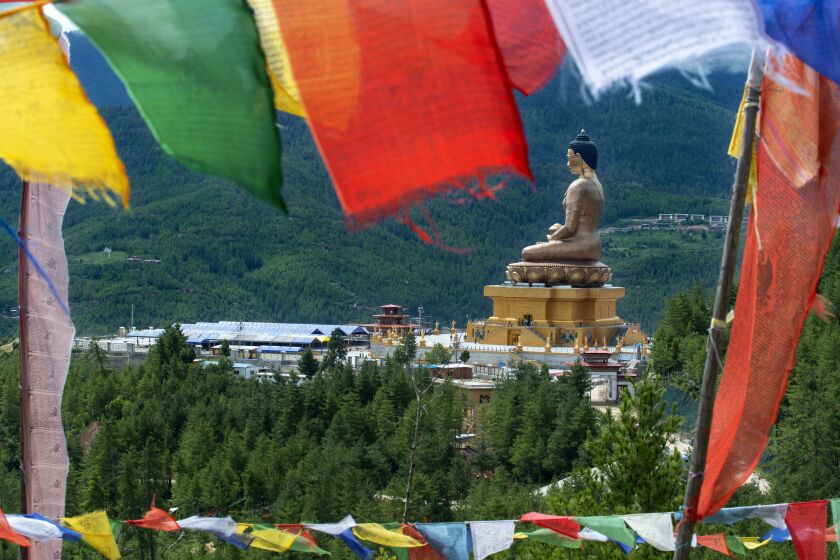 Landmark of Thimphu City, Bhutan, Kuenselphodrang, Buddha Dordenma, statue of Lord Buddha with Prayer flags. (Photo by: Sergi Reboredo/VW Pics/Universal Images Group via Getty Images)