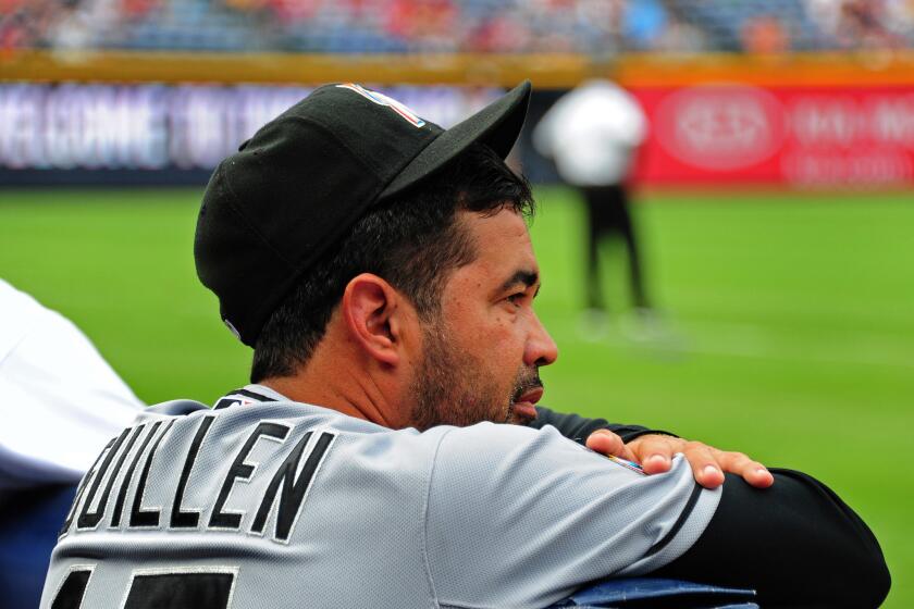 Manager Ozzie Guillen of the Miami Marlins is at odds with struggling closer Heath Bell.