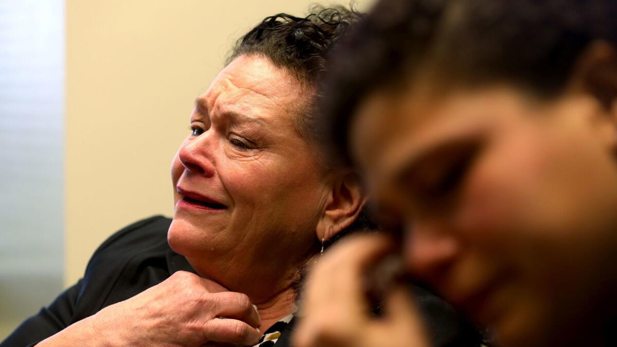 Sheri Camprone, left, is overcome with emotion as she talks about her son Brendon Glenn, 29, who was killed last year by an LAPD officer in a shooting that continues to draw headlines. At right is Glenn's sister, Brittany Glenn.