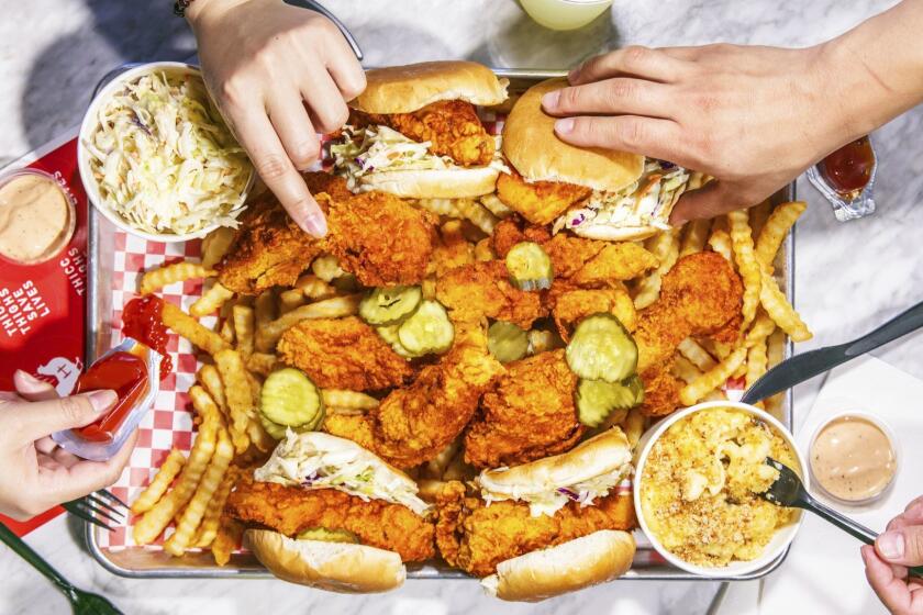 CHINO HILLS, CALIFORNIA - APR. 25, 2019: Hotties Nashville Hot Chicken offers hot-chicken combos including breast and thigh meat tenders, sliders, and sides like crinkle-cut fries, truffle mac & cheese, and their signature slaw, as photographed on Thursday, Apr. 25, 2019, at the restaurant in a shopping center in Chino Hills. The restaurant is run by John Park and chef Michael Pham. (Photo / Silvia Razgova) 3076302_la-fo-nashville-hot-chicken-Hotties