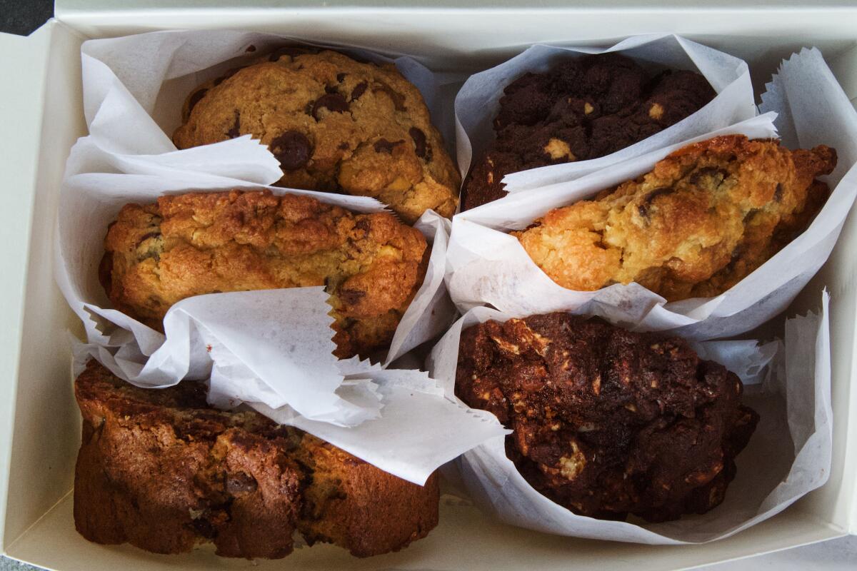 A box of six of Levain Bakery's signature cookies, each in a paper sleeve
