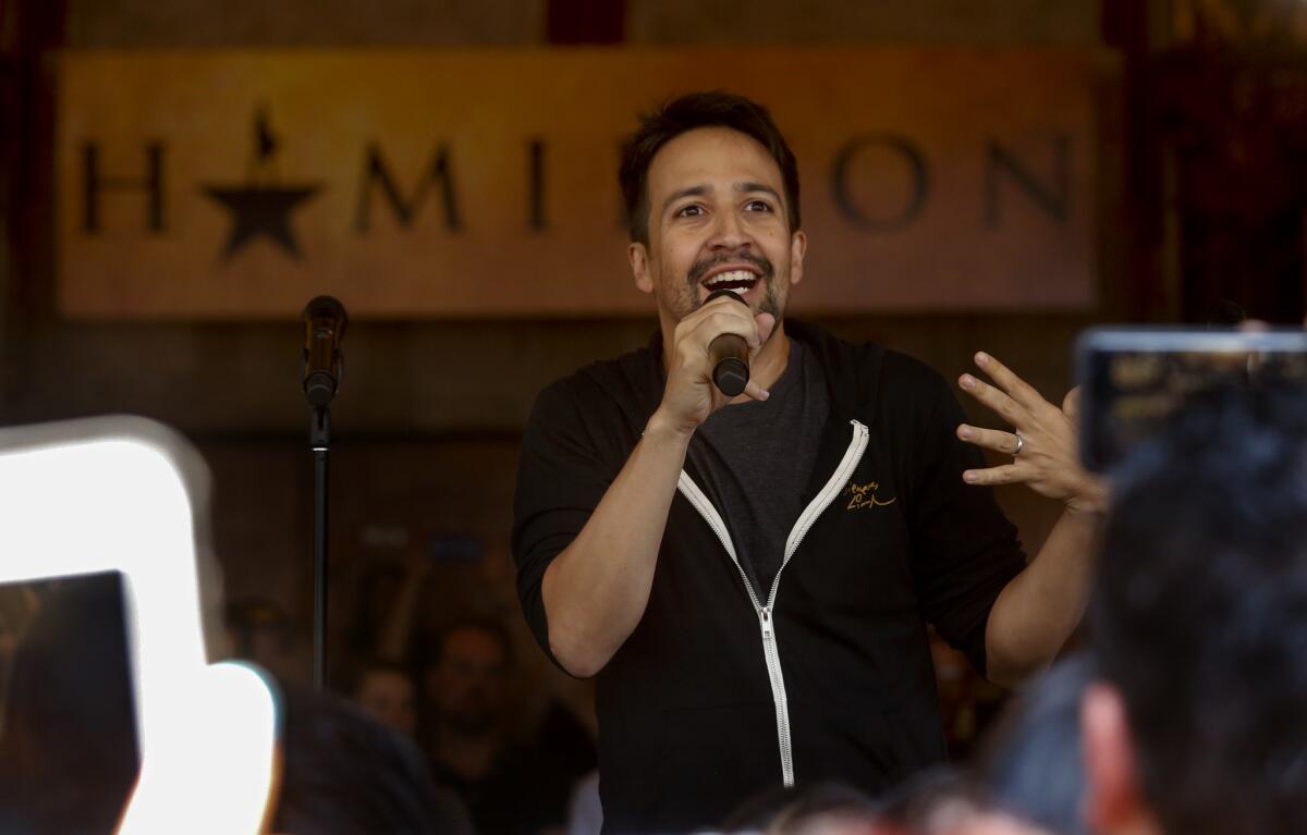 Lin-Manuel Miranda, creator of the smash hit "Hamilton," is shown outside the Pantages before the show.