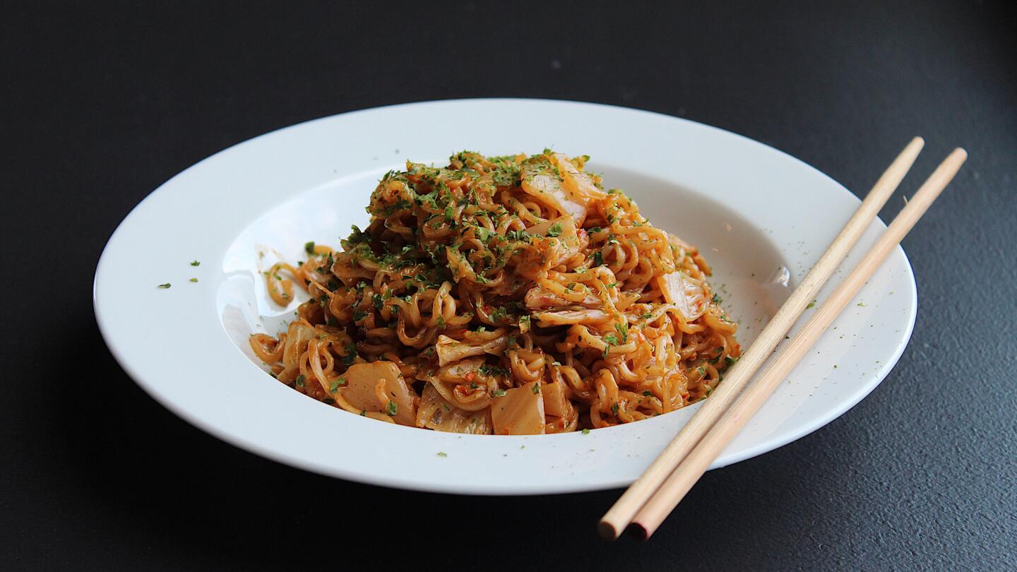 Sapporo Ichiban Chow Mein noodles with butter, kimchi and American cheese, cooked by Nick Kindelsperger.
