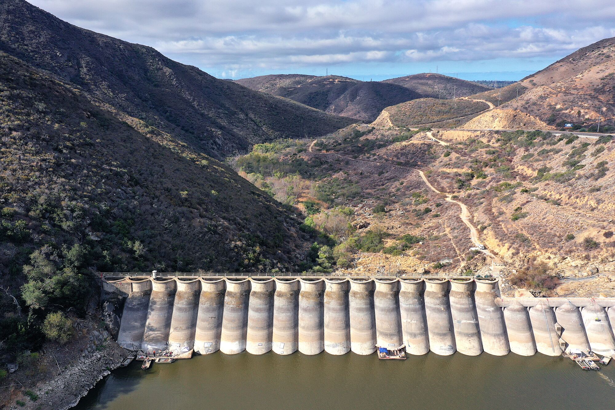 An aerial view of Hodges Dam and the hills above Lake Hodges