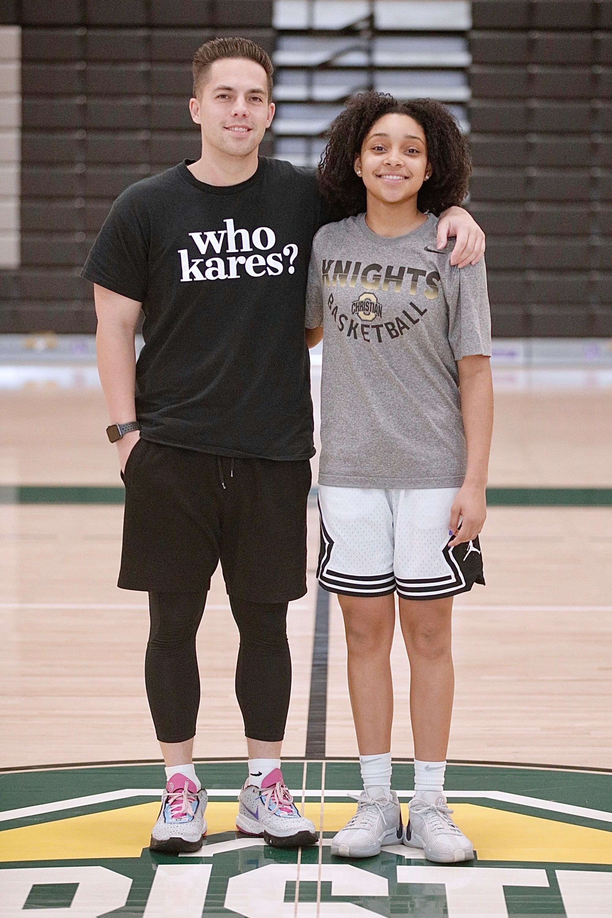 Ontario Christian coach Matt Tumambing, left, and freshman star Kaleena Smith pose for a photo at the school's gym.