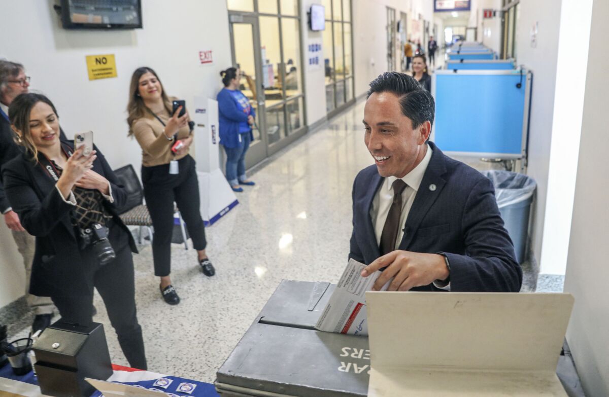 San Diego Mayor Todd Gloria casts his ballot at the San Diego County Registrar of Voters.