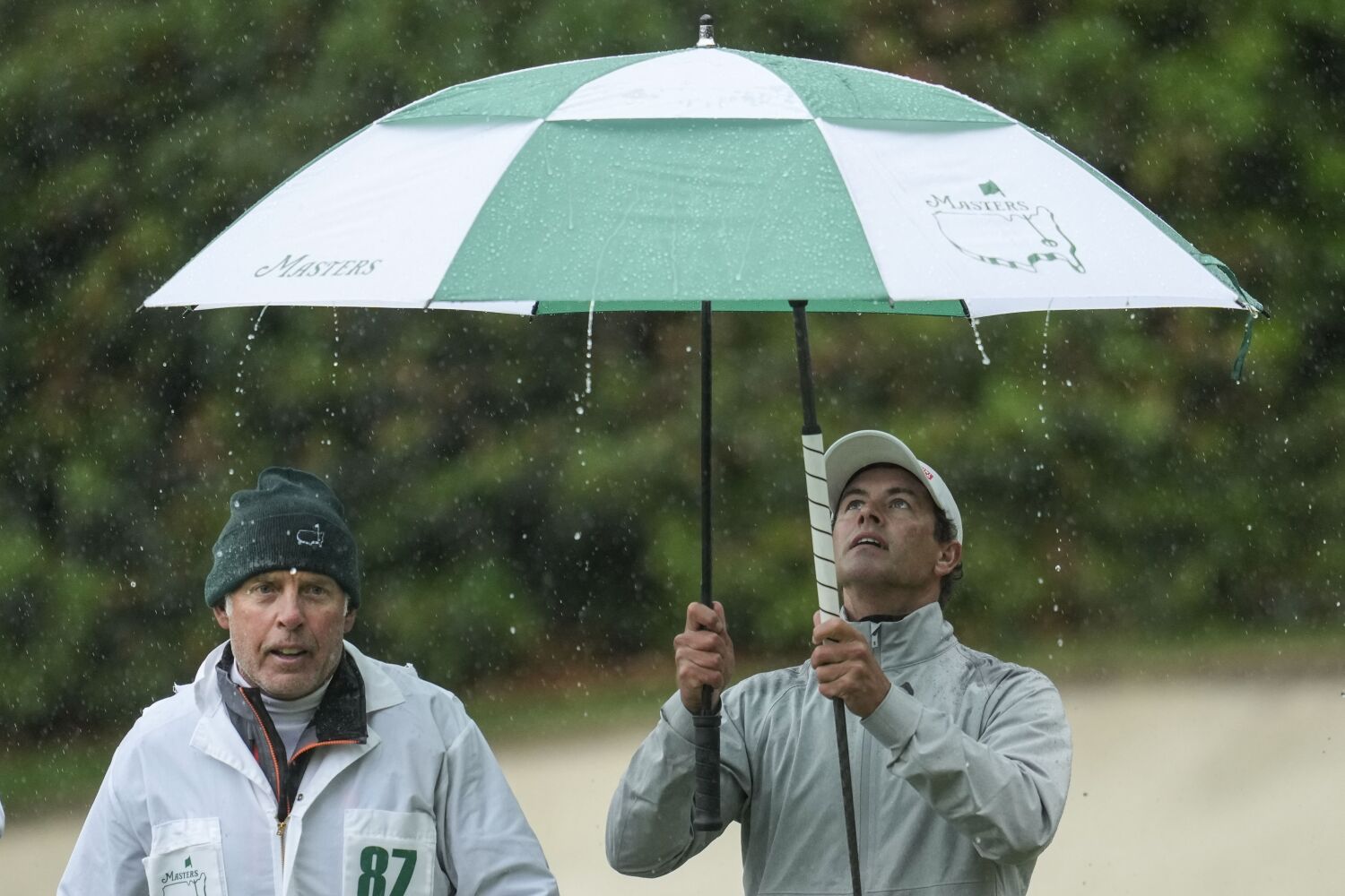 Brooks Koepka extends lead before rain suspends third-round play at Masters