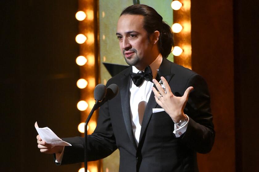 Lin-Manuel Miranda accepts the award for best original score for "Hamilton" at the Tony Awards on June 12 in New York.