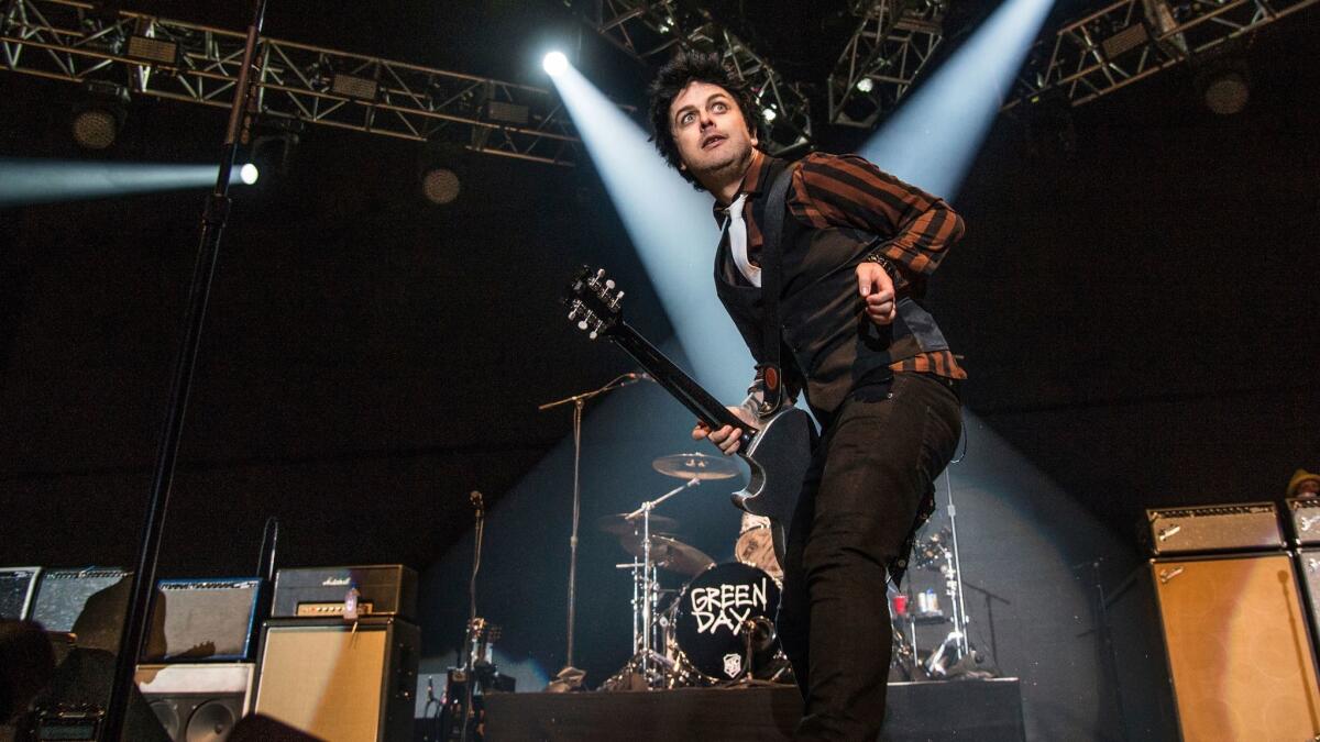 Green Day's Billie Joe Armstrong, for whom looking back means paring down.