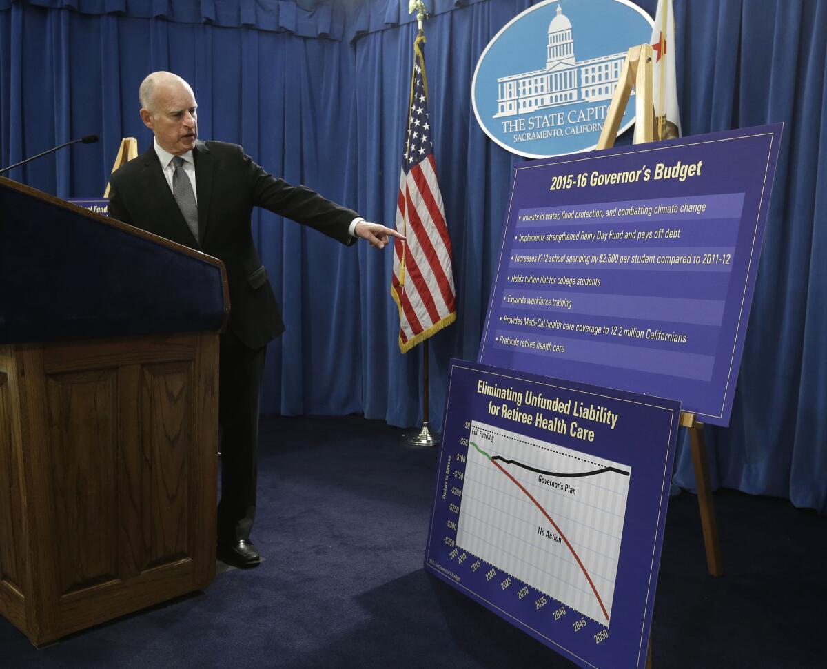 Gov. Jerry Brown outlines the high points of his proposed 2015-16 state budget plan at a news conference in Sacramento.