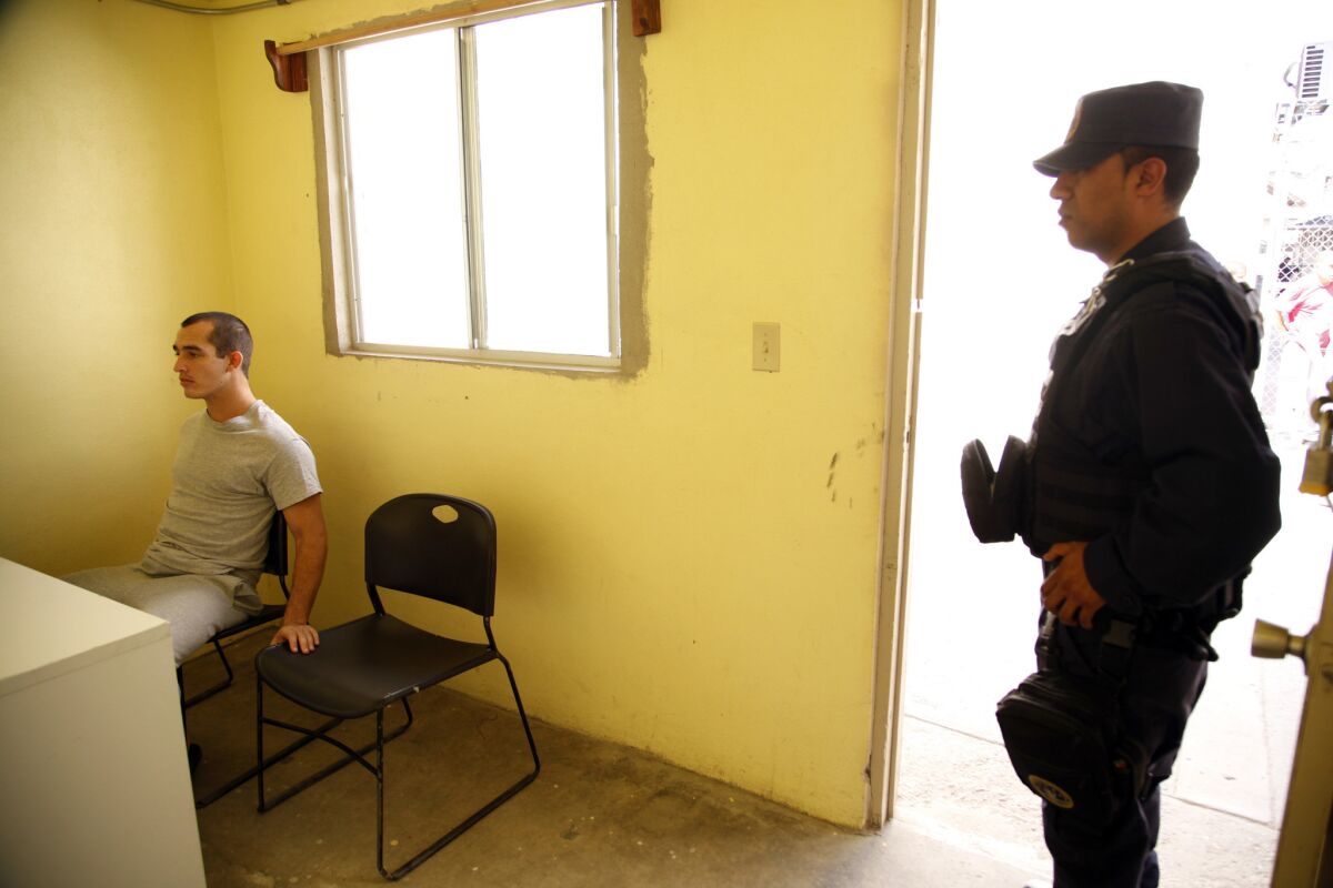 Ex-Marine Sgt. Andrew Tahmooressi, left, is being held at Tijuana's La Mesa Penitentiary.