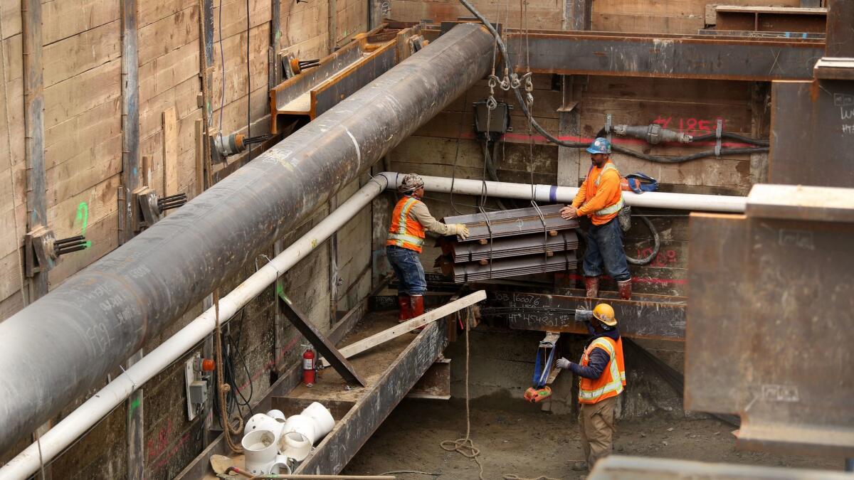 Construction is underway on the first phase of the Purple Line subway at La Brea and Wilshire boulevards.
