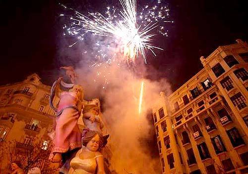 During the wee hours of the festival, fireworks light up a falla - a kind of float - in a Valencia plaza.