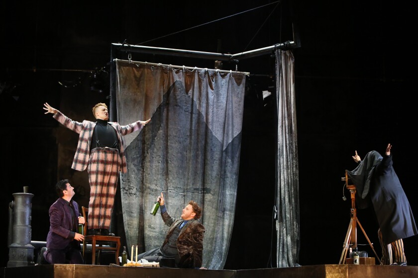 Saimir Pirgu, left, Michael J. Hawk, Nicholas Brownlee and Kihun Yoon in Barrie Kosky’s “La Bohéme” at the Dorothy Chandler Pavilion.