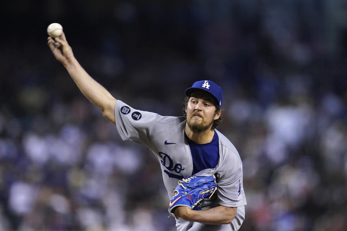 Dodgers starting pitcher Trevor Bauer throws against the Arizona Diamondbacks.