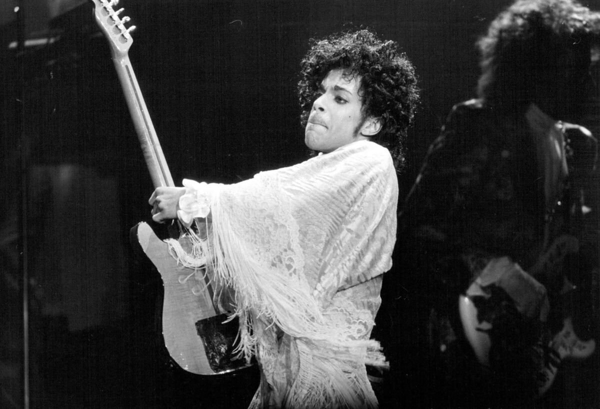 Prince performs at the St. Paul Civic Center in St. Paul, Minn., on Dec. 25, 1984.