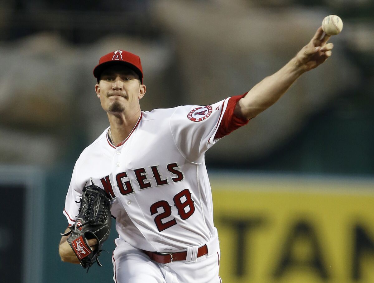 Angels starting pitcher Andrew Heaney delivers a pitch against the Chicago Cubs on April 5, 2016, his only game last season.