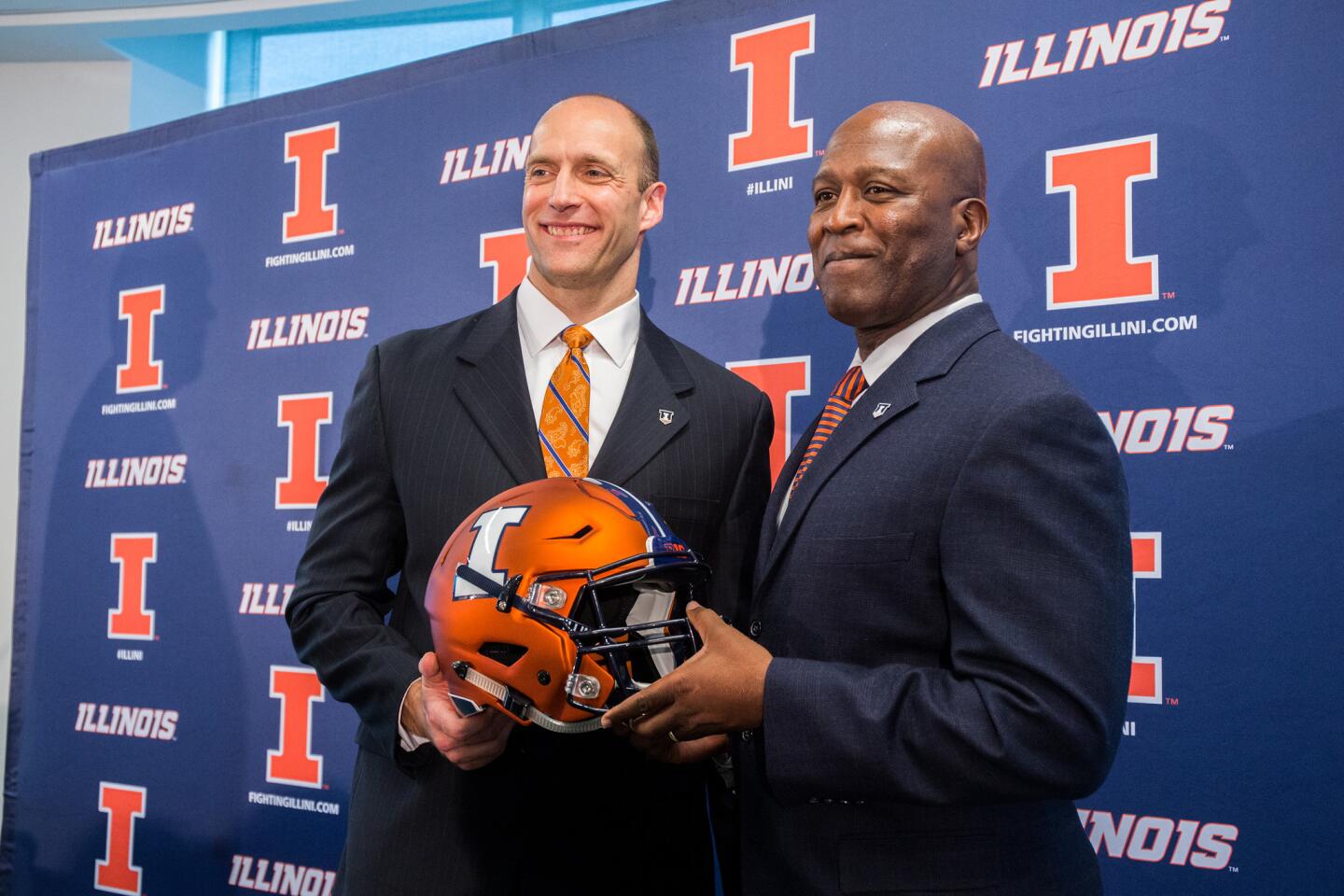 Lovie Smith is introduced by athletic director Josh Whitman as Illini head coach at the Bielfeldt Athletics Administration Building in Champaign on Monday, March 7, 2016.